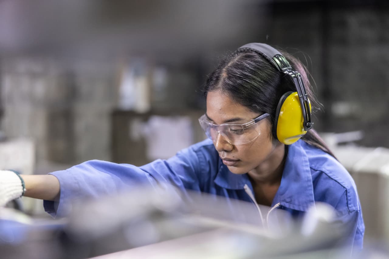 Engineer wearing ear and eye protection