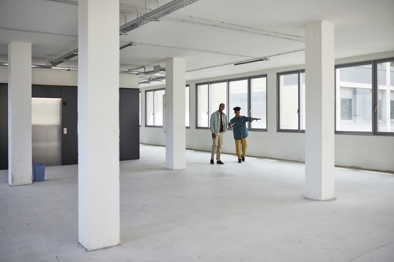 People looking around a commercial property space