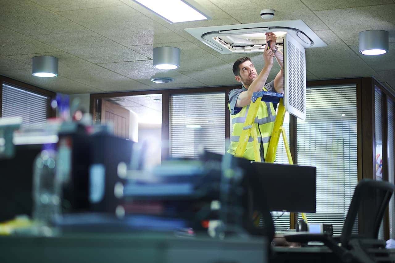 Air conditioning engineer working in an office