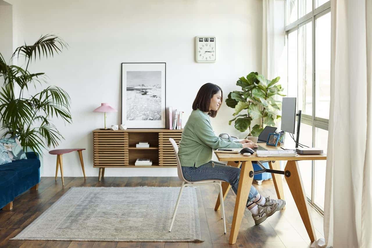 Business consultant working from home in a bright home office