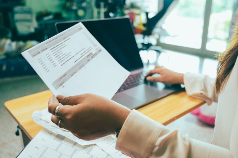 Business owner looking at an invoice