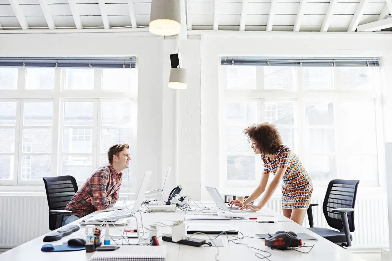 Business colleages working in an office together