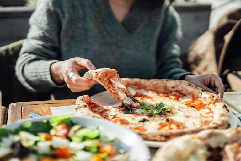 Customer enjoying a pizza