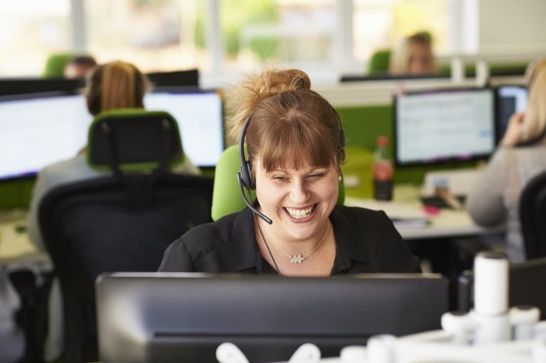 Smiling call centre worker