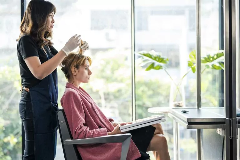 Customer in a bright hair salon