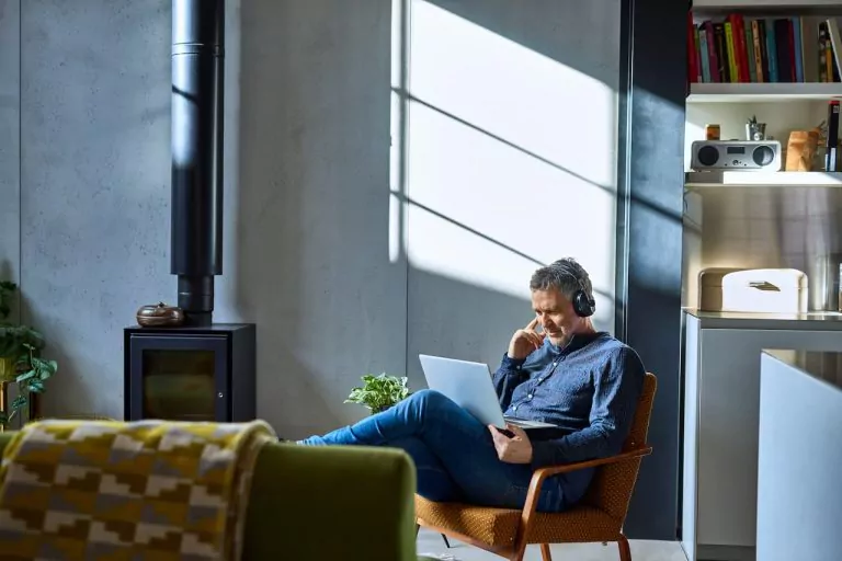 Freelancer on a laptop in their home