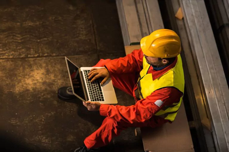 Contractor using laptop